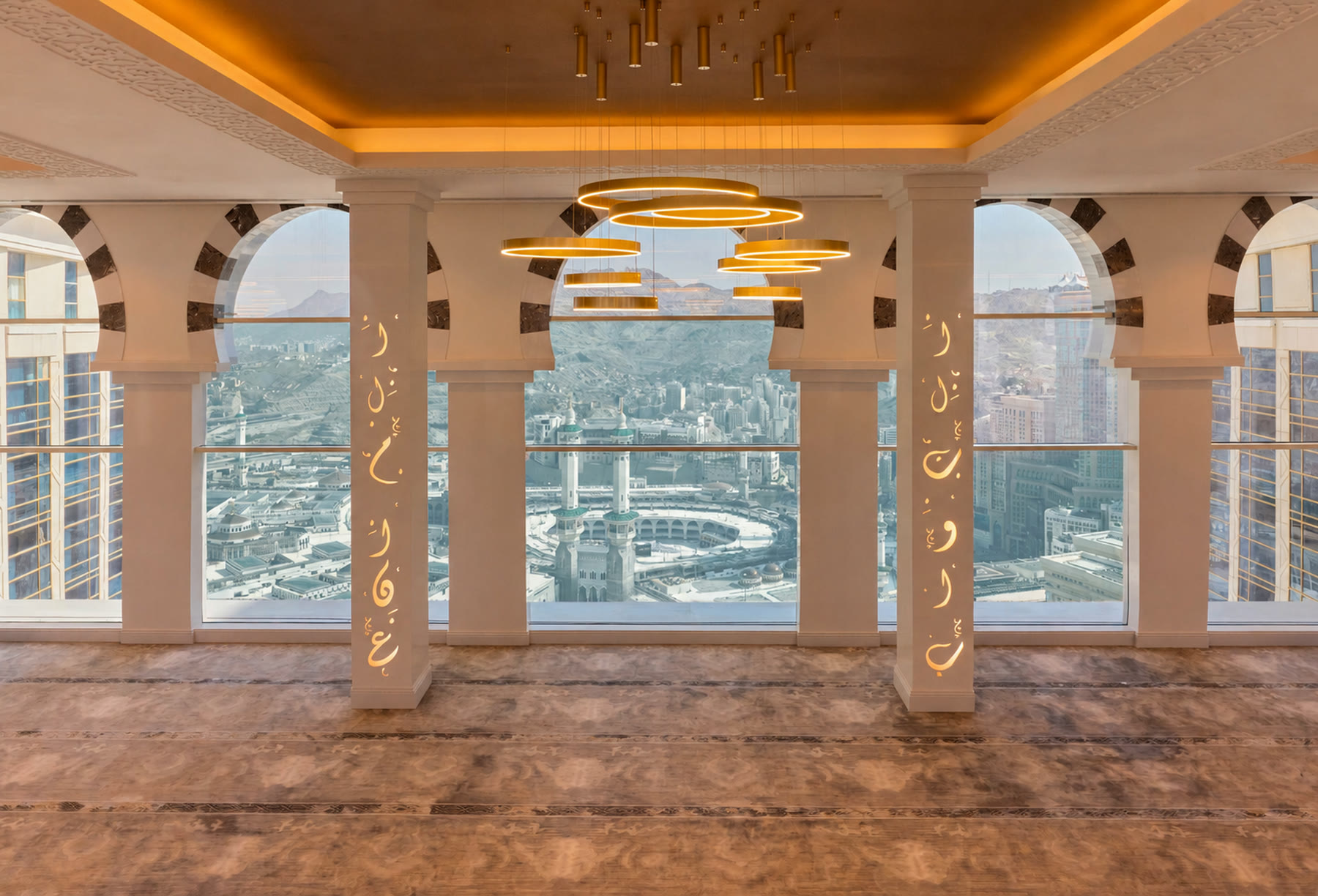 Prayer hall at Address Jabal Omar, the Haram framed through the arches